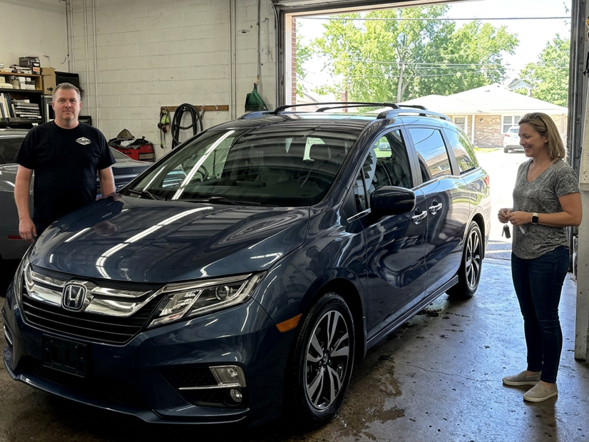 happy customer with safe beautiful van after getting minor collision repair in Downers Grove IL at Bob Carter